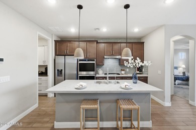 Situated on Hole 14, this beautifully upgraded home showcases on Verrado Golf Club - Victory in Arizona - for sale on GolfHomes.com, golf home, golf lot