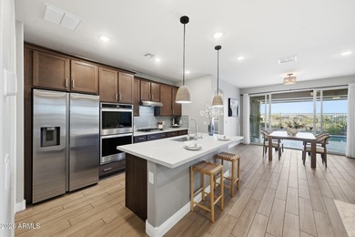 Situated on Hole 14, this beautifully upgraded home showcases on Verrado Golf Club - Victory in Arizona - for sale on GolfHomes.com, golf home, golf lot