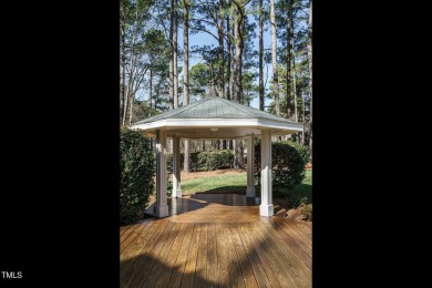 This Sunset Ridge home is sure to impress with a golf course on Devils Ridge Golf Club in North Carolina - for sale on GolfHomes.com, golf home, golf lot