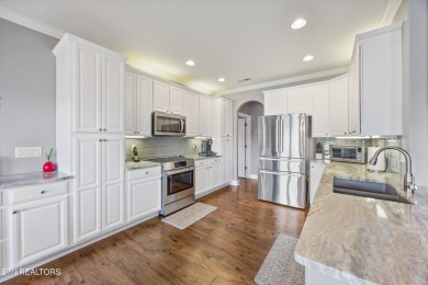 Low-Maintenance Luxury Living in the Heart of Tellico Village.

 on Tanasi Golf Course in Tennessee - for sale on GolfHomes.com, golf home, golf lot