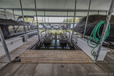 From Camdenton it's a 2-3 Minute Drive to this Pristine Lake on The Club At Old Kinderhook in Missouri - for sale on GolfHomes.com, golf home, golf lot