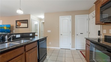 These condos are hard to come by at The Pines at Osage National on Osage National Golf Club in Missouri - for sale on GolfHomes.com, golf home, golf lot