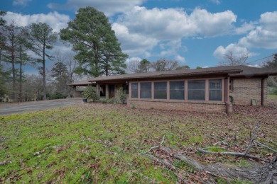 Exceptional opportunity to acquire a handyman special property! S on Hide-A-Way Lake Golf Course in Texas - for sale on GolfHomes.com, golf home, golf lot