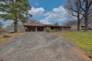 Exceptional opportunity to acquire a handyman special property! S on Hide-A-Way Lake Golf Course in Texas - for sale on GolfHomes.com, golf home, golf lot