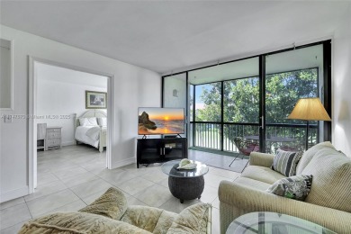 Discover the essence of beachside living in this recentlly on Ocean Village Golf Course in Florida - for sale on GolfHomes.com, golf home, golf lot