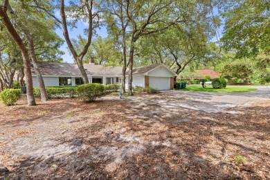 Nestled on a spacious 1/3-acre corner lot backing to a peaceful on Golf Club at Bluewater Bay Resort in Florida - for sale on GolfHomes.com, golf home, golf lot