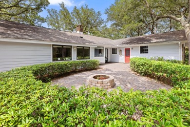 Nestled on a spacious 1/3-acre corner lot backing to a peaceful on Golf Club at Bluewater Bay Resort in Florida - for sale on GolfHomes.com, golf home, golf lot