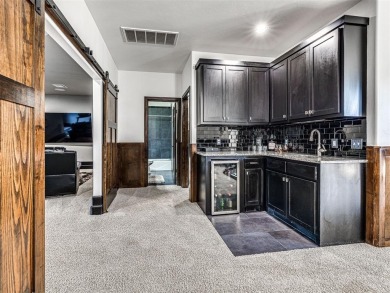 Located in the prestigious gated community of Rose Creek, this on Rose Creek Golf Club in Oklahoma - for sale on GolfHomes.com, golf home, golf lot