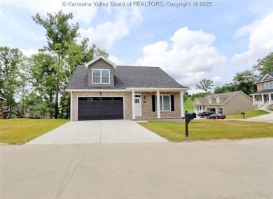 Stunning new construction home with a bright open layout with on Little Creek Country Club in West Virginia - for sale on GolfHomes.com, golf home, golf lot