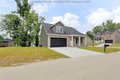 Stunning new construction home with a bright open layout with on Little Creek Country Club in West Virginia - for sale on GolfHomes.com, golf home, golf lot
