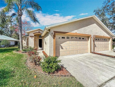 Welcome to 13252 Norman Circle located in Fairway Villas at on Meadow Oaks Golf and Country Club in Florida - for sale on GolfHomes.com, golf home, golf lot