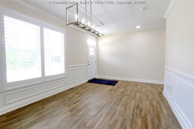 Stunning new construction home with a bright open layout with on Little Creek Country Club in West Virginia - for sale on GolfHomes.com, golf home, golf lot