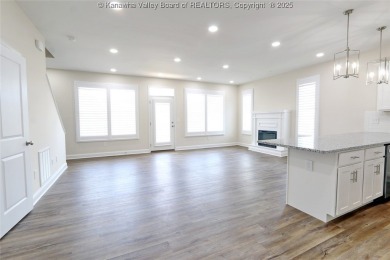 Stunning new construction home with a bright open layout with on Little Creek Country Club in West Virginia - for sale on GolfHomes.com, golf home, golf lot