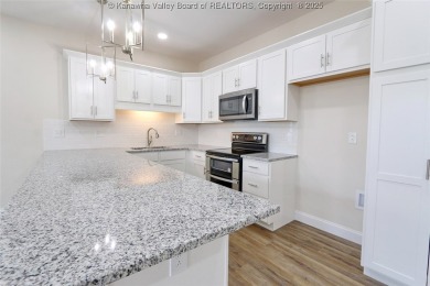 Stunning new construction home with a bright open layout with on Little Creek Country Club in West Virginia - for sale on GolfHomes.com, golf home, golf lot