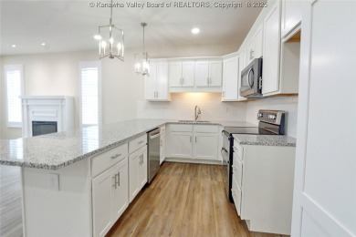 Stunning new construction home with a bright open layout with on Little Creek Country Club in West Virginia - for sale on GolfHomes.com, golf home, golf lot