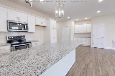 Stunning new construction home with a bright open layout with on Little Creek Country Club in West Virginia - for sale on GolfHomes.com, golf home, golf lot