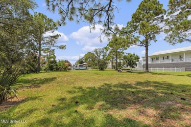 Welcome to 129 Sweet Bay Dr., a stunning coastal retreat nestled on Pass Christian Isles Golf Club in Mississippi - for sale on GolfHomes.com, golf home, golf lot