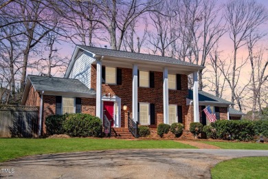 Nestled alongside the picturesque 7th fairway at Forest Oaks on Forest Oaks Country Club in North Carolina - for sale on GolfHomes.com, golf home, golf lot