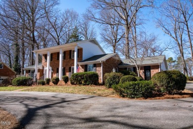 Nestled alongside the picturesque 7th fairway at Forest Oaks on Forest Oaks Country Club in North Carolina - for sale on GolfHomes.com, golf home, golf lot