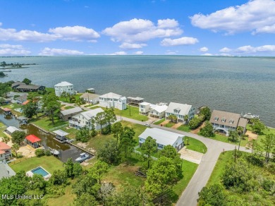 Welcome to 129 Sweet Bay Dr., a stunning coastal retreat nestled on Pass Christian Isles Golf Club in Mississippi - for sale on GolfHomes.com, golf home, golf lot