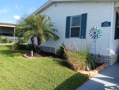 This Beautiful, well maintained home is located with views of on Four Lakes Golf Club in Florida - for sale on GolfHomes.com, golf home, golf lot