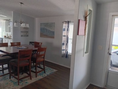 This Beautiful, well maintained home is located with views of on Four Lakes Golf Club in Florida - for sale on GolfHomes.com, golf home, golf lot