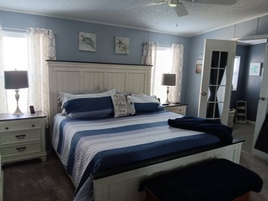 This Beautiful, well maintained home is located with views of on Four Lakes Golf Club in Florida - for sale on GolfHomes.com, golf home, golf lot