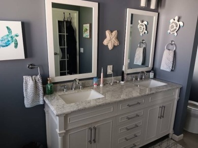 This Beautiful, well maintained home is located with views of on Four Lakes Golf Club in Florida - for sale on GolfHomes.com, golf home, golf lot