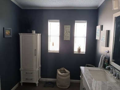 This Beautiful, well maintained home is located with views of on Four Lakes Golf Club in Florida - for sale on GolfHomes.com, golf home, golf lot