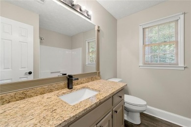 Recently renovated ranch home with, new deck and newer roof is on Honey Creek Country Club in Georgia - for sale on GolfHomes.com, golf home, golf lot