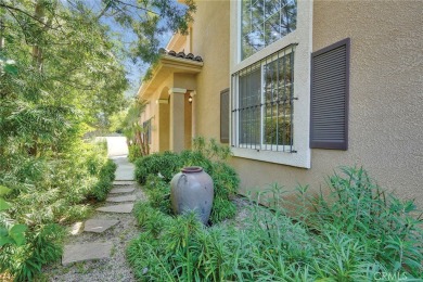 This beautiful Spanish inspired home is nestled at the end of a on Van Nuys Golf Course in California - for sale on GolfHomes.com, golf home, golf lot