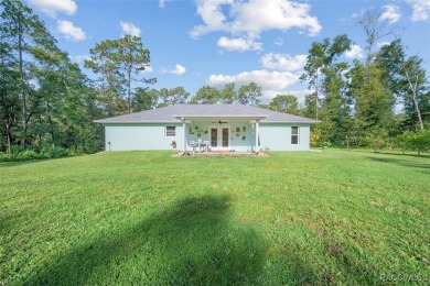 Welcome to this beautiful 3 bedroom, 2 bathroom home with a on Citrus Springs Country Club in Florida - for sale on GolfHomes.com, golf home, golf lot