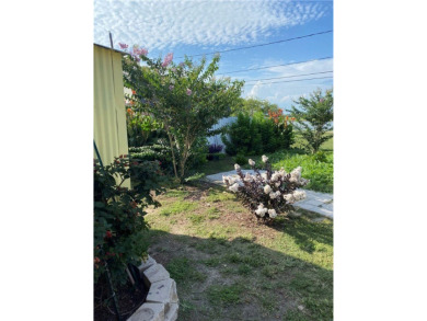 Discover the hidden treasure on a serene golf course with a on Oso Beach Municipal Golf Course in Texas - for sale on GolfHomes.com, golf home, golf lot