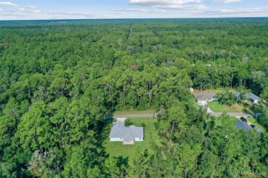 Welcome to this beautiful 3 bedroom, 2 bathroom home with a on Citrus Springs Country Club in Florida - for sale on GolfHomes.com, golf home, golf lot
