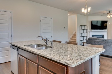 Welcome to your new home, boasting a private inground pool built on Sage Valley Golf Club in South Carolina - for sale on GolfHomes.com, golf home, golf lot