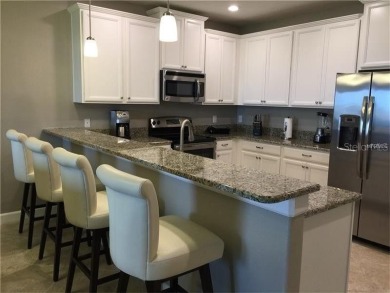 Start living the resort lifestyle in this BEAUTIFUL 3 bedroom 2 on The Oasis Club at Champions Gate in Florida - for sale on GolfHomes.com, golf home, golf lot