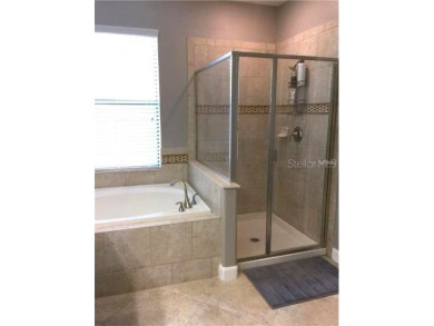 Start living the resort lifestyle in this BEAUTIFUL 3 bedroom 2 on The Oasis Club at Champions Gate in Florida - for sale on GolfHomes.com, golf home, golf lot