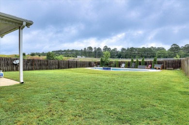 Welcome to your new home, boasting a private inground pool built on Sage Valley Golf Club in South Carolina - for sale on GolfHomes.com, golf home, golf lot