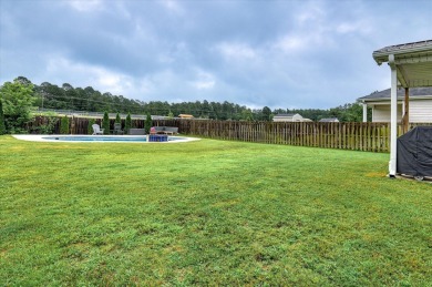 Welcome to your new home, boasting a private inground pool built on Sage Valley Golf Club in South Carolina - for sale on GolfHomes.com, golf home, golf lot