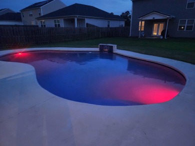 Welcome to your new home, boasting a private inground pool built on Sage Valley Golf Club in South Carolina - for sale on GolfHomes.com, golf home, golf lot