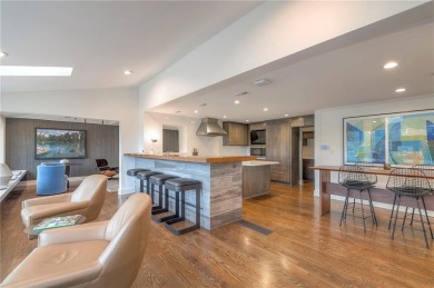 Step inside this stunning lakefront home and just say *wow* on Lake Quivira Country Club in Kansas - for sale on GolfHomes.com, golf home, golf lot