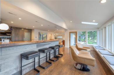 Step inside this stunning lakefront home and just say *wow* on Lake Quivira Country Club in Kansas - for sale on GolfHomes.com, golf home, golf lot