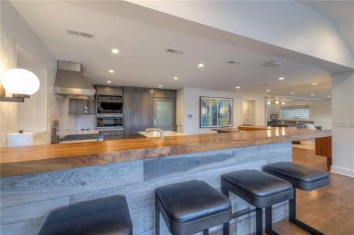 Step inside this stunning lakefront home and just say *wow* on Lake Quivira Country Club in Kansas - for sale on GolfHomes.com, golf home, golf lot
