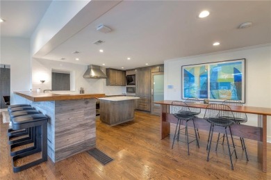 Step inside this stunning lakefront home and just say *wow* on Lake Quivira Country Club in Kansas - for sale on GolfHomes.com, golf home, golf lot