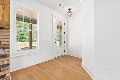 Located within the gated community of StillWaters, this on Stillwaters Golf and Country Club in Alabama - for sale on GolfHomes.com, golf home, golf lot