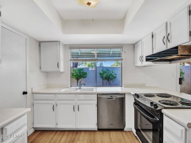 Step into this welcoming single-level townhome nestled in the on Bellaire Golf Club in Arizona - for sale on GolfHomes.com, golf home, golf lot