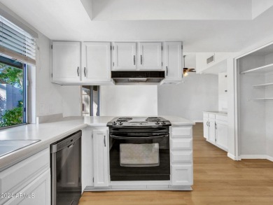 Step into this welcoming single-level townhome nestled in the on Bellaire Golf Club in Arizona - for sale on GolfHomes.com, golf home, golf lot