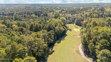 This golf front oasis is located on the picturesque 12th hole of on Seven Lakes Country Club in North Carolina - for sale on GolfHomes.com, golf home, golf lot