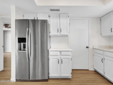 Step into this welcoming single-level townhome nestled in the on Bellaire Golf Club in Arizona - for sale on GolfHomes.com, golf home, golf lot