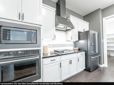 Family FRIENDLY !  The Frisco has it ALL with integrated kitchen on Heath Golf and Yacht Club in Texas - for sale on GolfHomes.com, golf home, golf lot